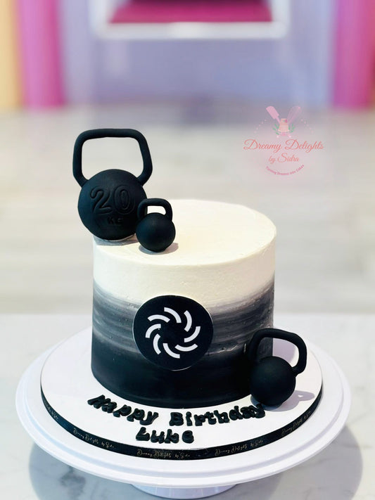 Gym birthday cake for him with kettlebell decorations handcrafted by Dreamy Delights by Sidra in Dubai.