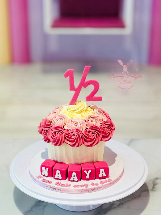 Half birthday giant cupcake cake for girls Dubai