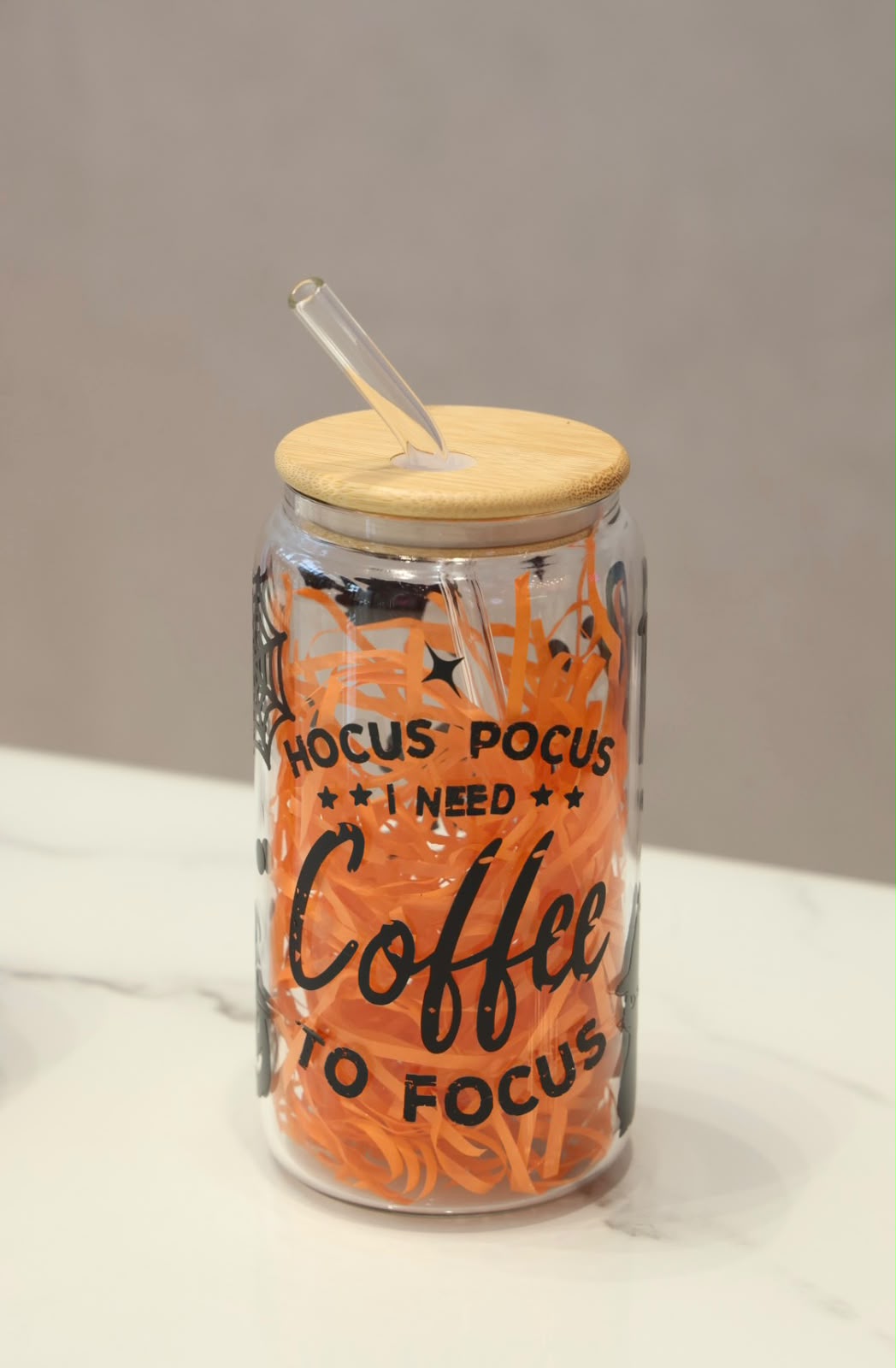Halloween Hocus Pocus tumbler gift with ghost and black cat prints, bamboo-style lid and straw by Dreamy Delights by Sidra in Dubai.

