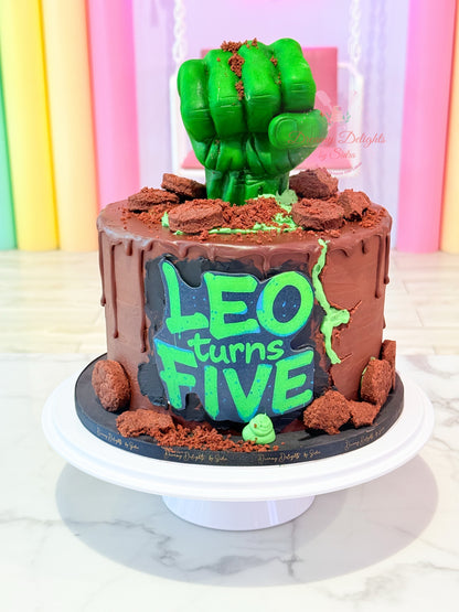 Hulk fist birthday cake with superhero theme design for boys kids party in Dubai