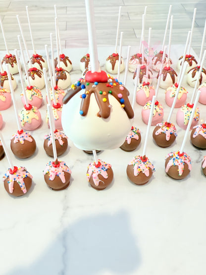 Ice cream themed cake pops with sprinkles for kids birthday party dessert table Dubai