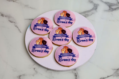 International Women's Day decorated sugar cookies with empowerment design on round cookies in Dubai