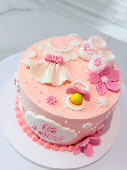 Its a girl baby shoes cake