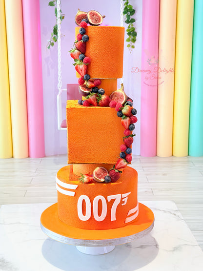 Tall James Bond 007 cake with multi-tier design, fresh fruits and luxury finish for men birthday in Dubai