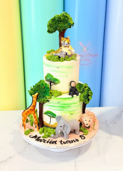 Jungle Theme Birthday Cake Dubai for boys with lion, elephant, giraffe animals and customized kids birthday cake design.