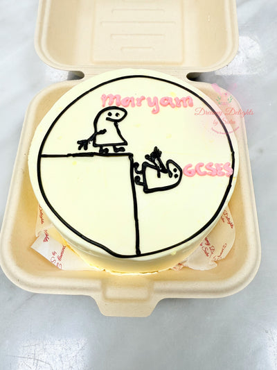 Funny kicking GCSEs bento cake Dubai — humorous school leavers cake for GCSE or end of year by Dreamy Delights by Sidra