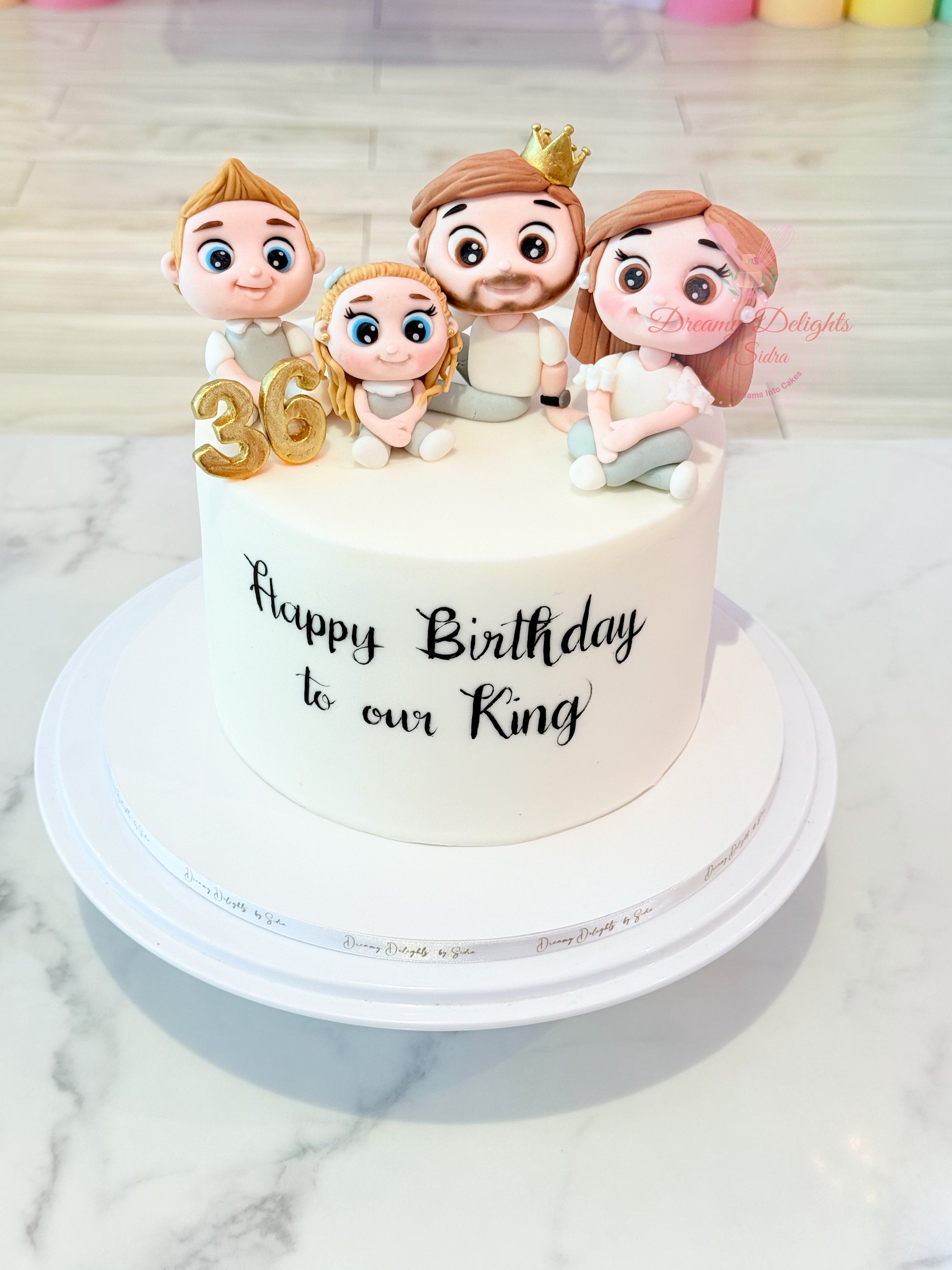King cake with royal themed design birthday cake for him in Dubai
