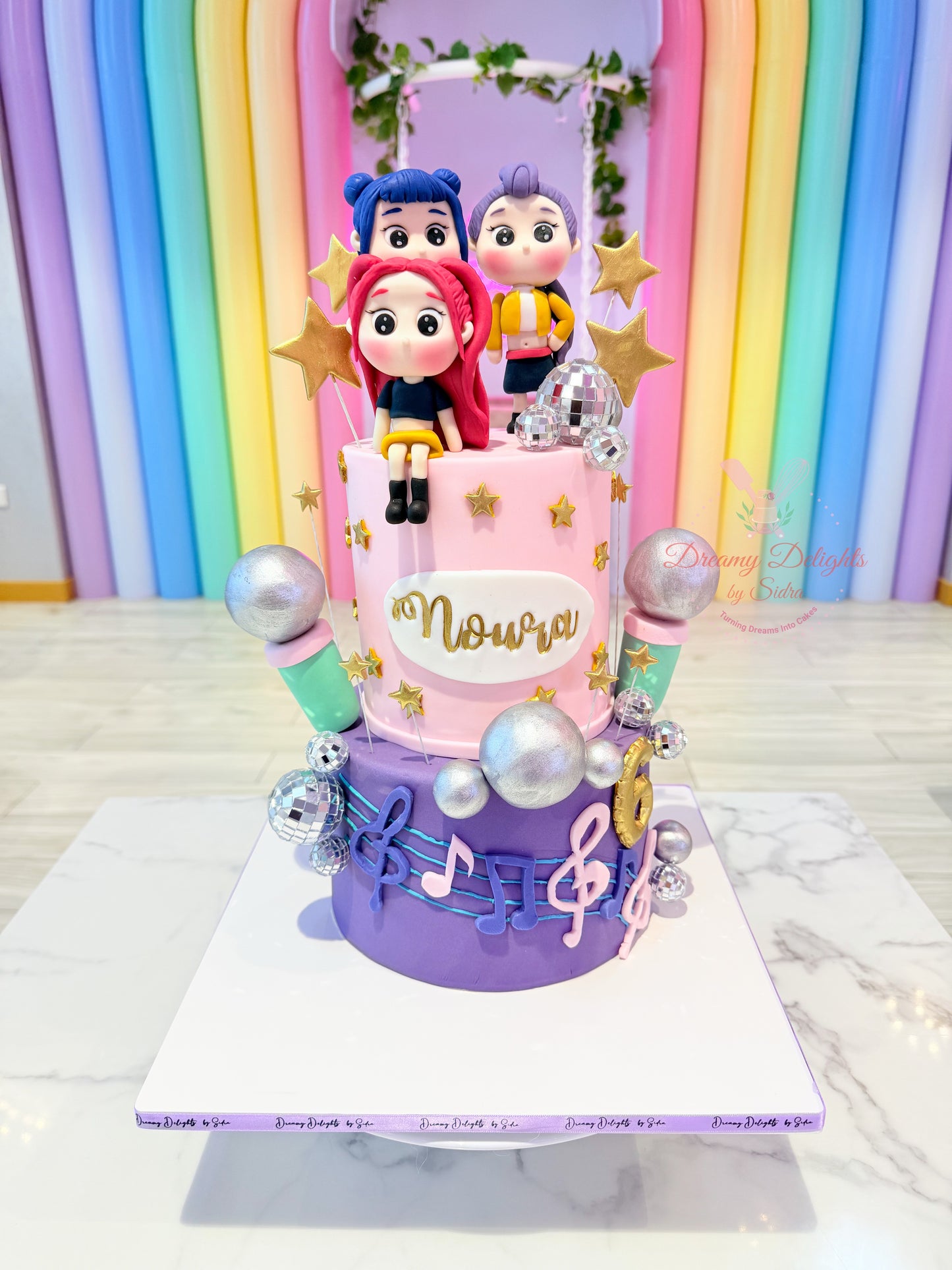 KPop 3D character birthday cake for girls with music theme design in Dubai