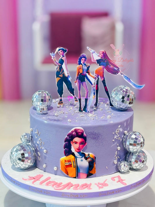 Kpop Demon Hunters cake Dubai with purple frosting, character toppers and non-edible disco balls by Dreamy Delights by Sidra