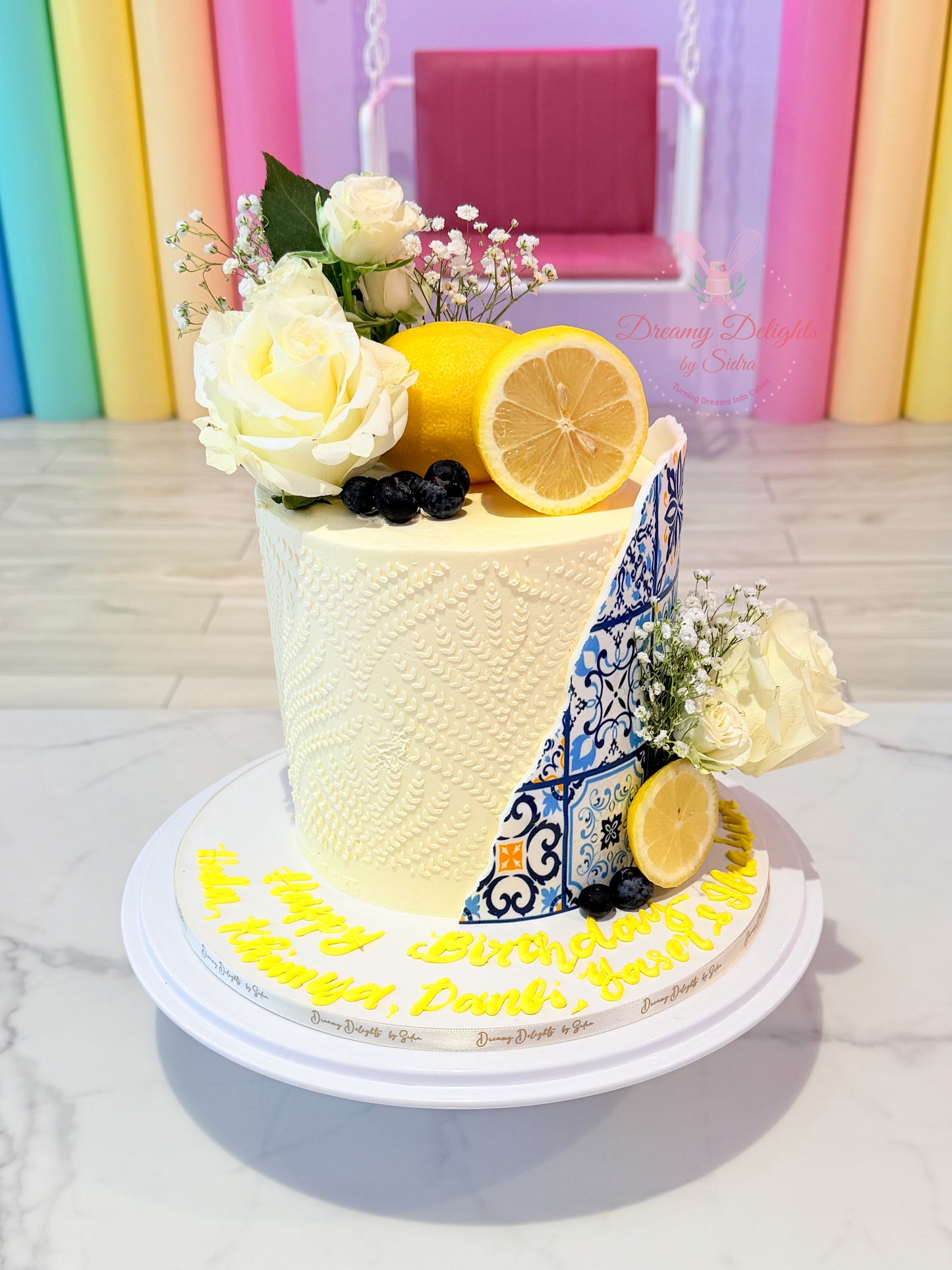 Luxury lemon tiles flower birthday cake for her with floral buttercream design in Dubai