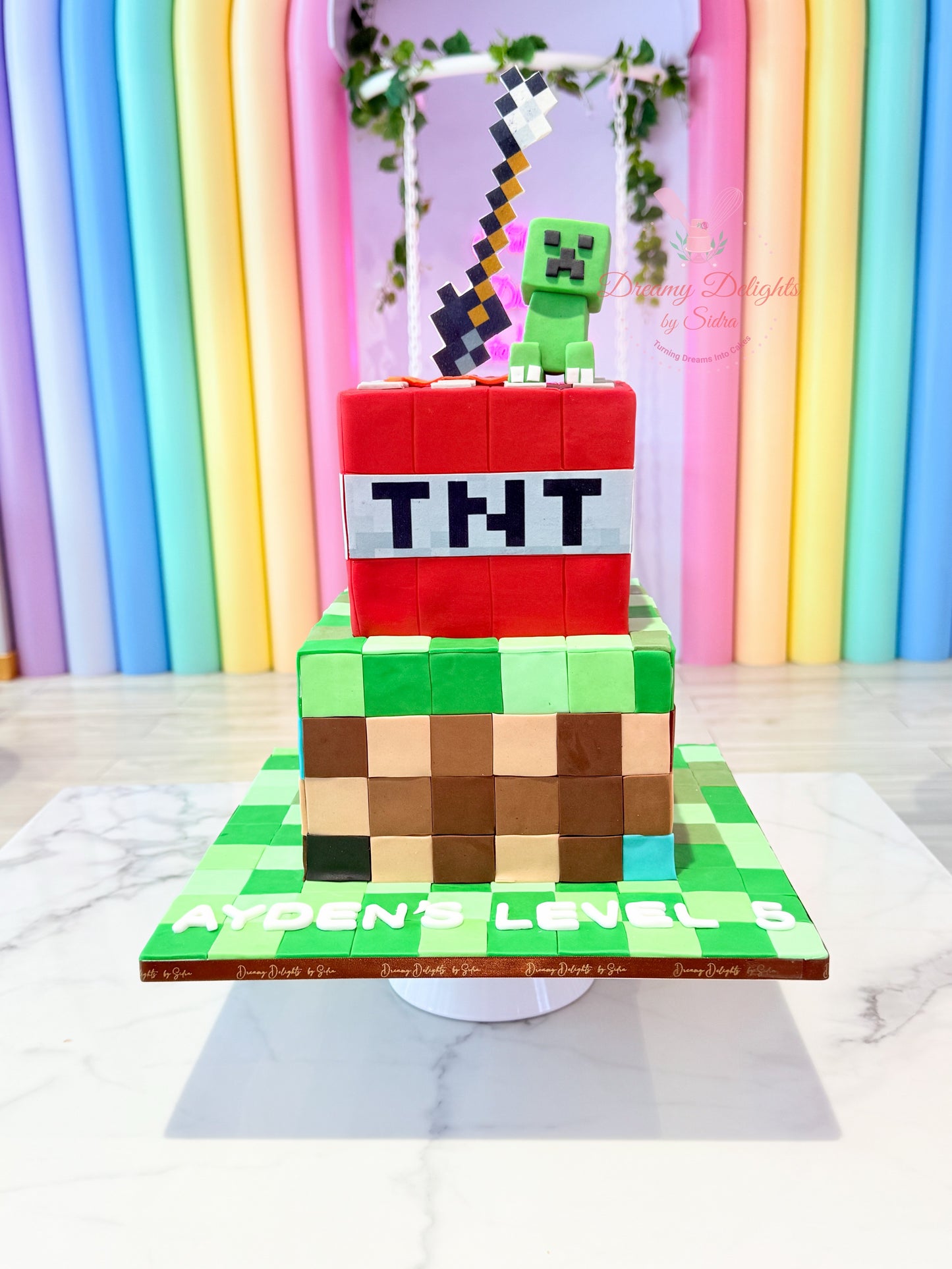 Minecraft themed birthday cake for boys with TNT block and Creeper design Dubai