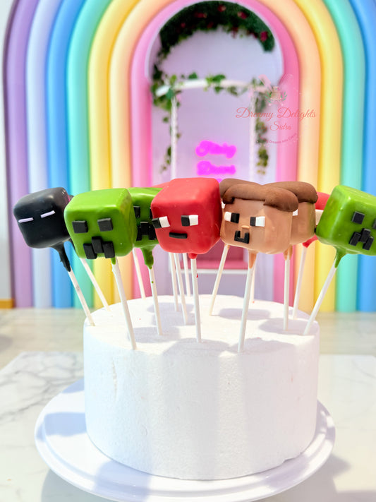 Minecraft themed cake pops for kids birthday party dessert table Dubai