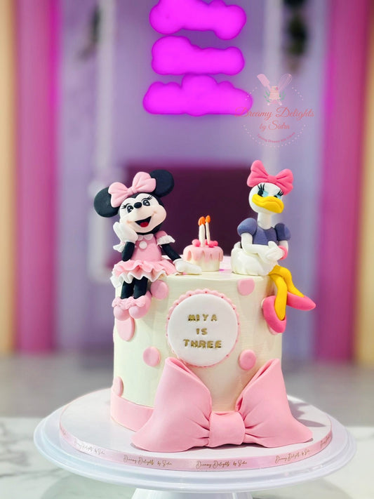 Minnie Mouse Donald Duck birthday cake for girls with pastel fondant design in Dubai