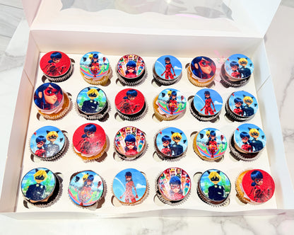 Miraculous Ladybug themed cupcakes with edible Ladybug and Cat Noir toppers for kids birthday parties in Dubai.