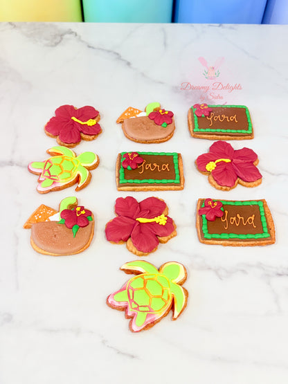 Moana themed cookies with hibiscus flower and sea turtle designs for kids birthday party Dubai