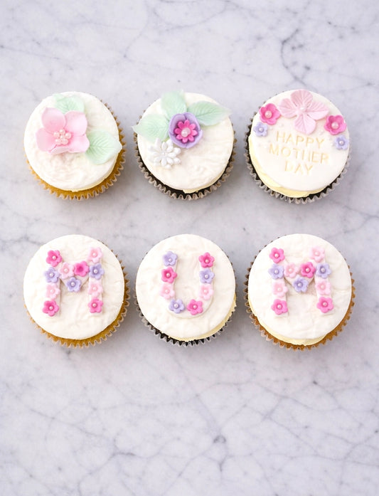 Mother’s Day floral cupcakes with mum lettering design in Dubai