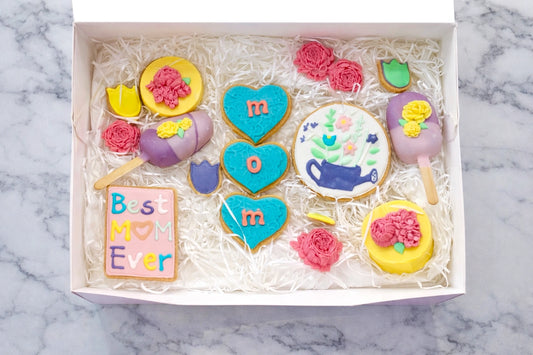 Mother’s Day premium treat bundle with cookies cakesicles and chocolate flowers in Dubai