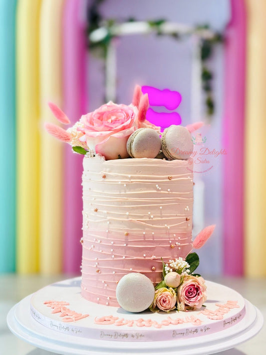 Pink rose ombre cake with macarons for her by Dreamy Delight by Sidra