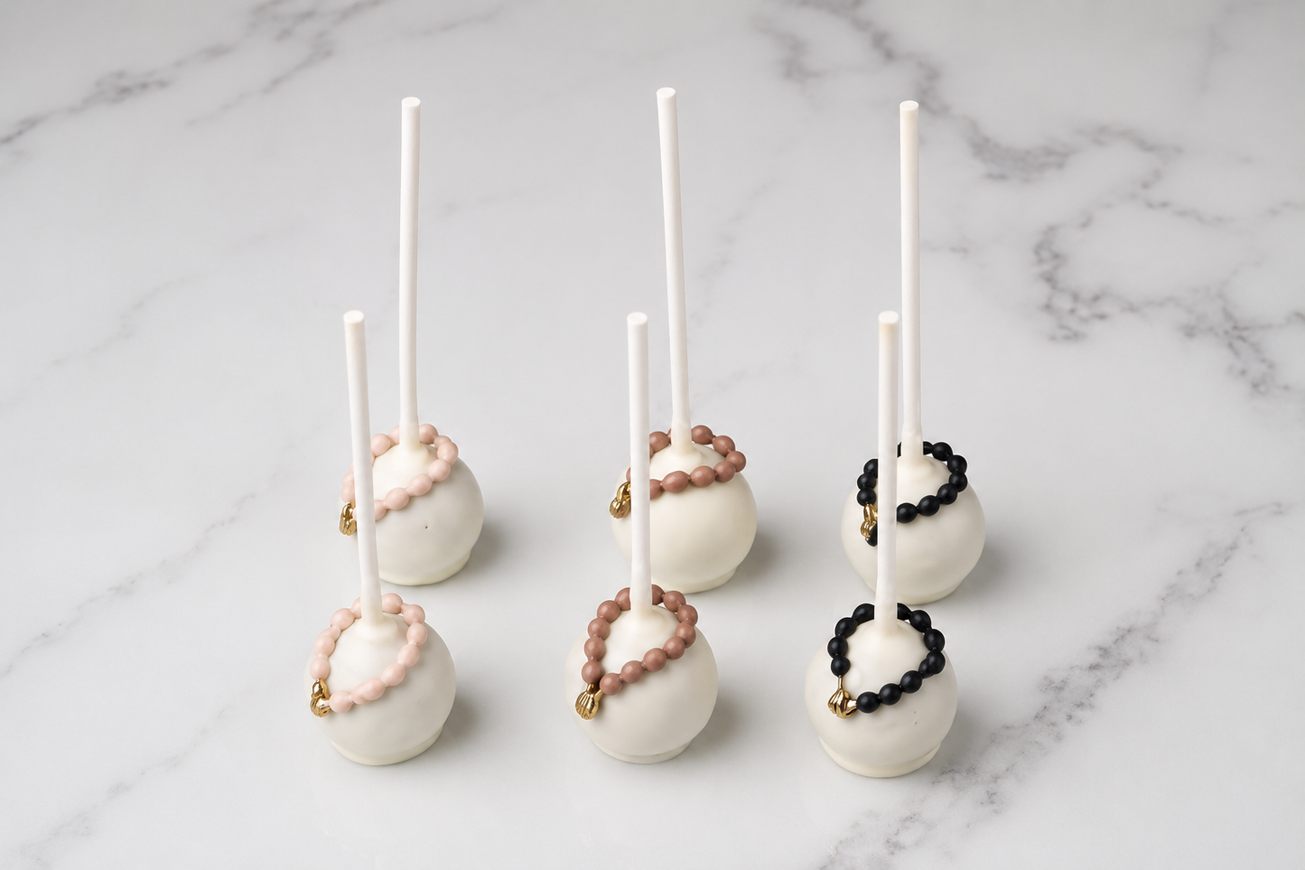 Prayer themed Eid cake pops with tasbeeh inspired decorations for Eid Al Adha celebrations in Dubai
