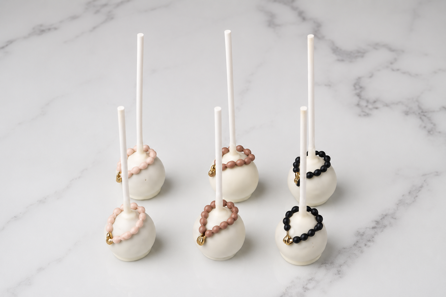 Prayer themed Eid cake pops with tasbeeh inspired decorations for Eid Al Adha celebrations in Dubai