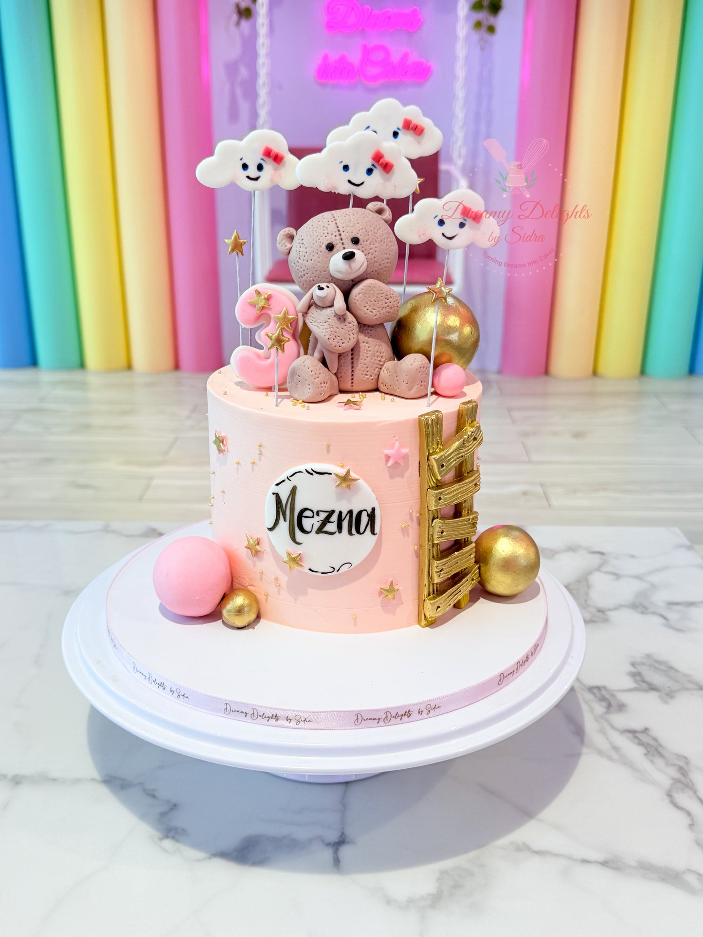 Girl Teddy Cake with pink design and teddy topper for kids birthday celebration in Dubai