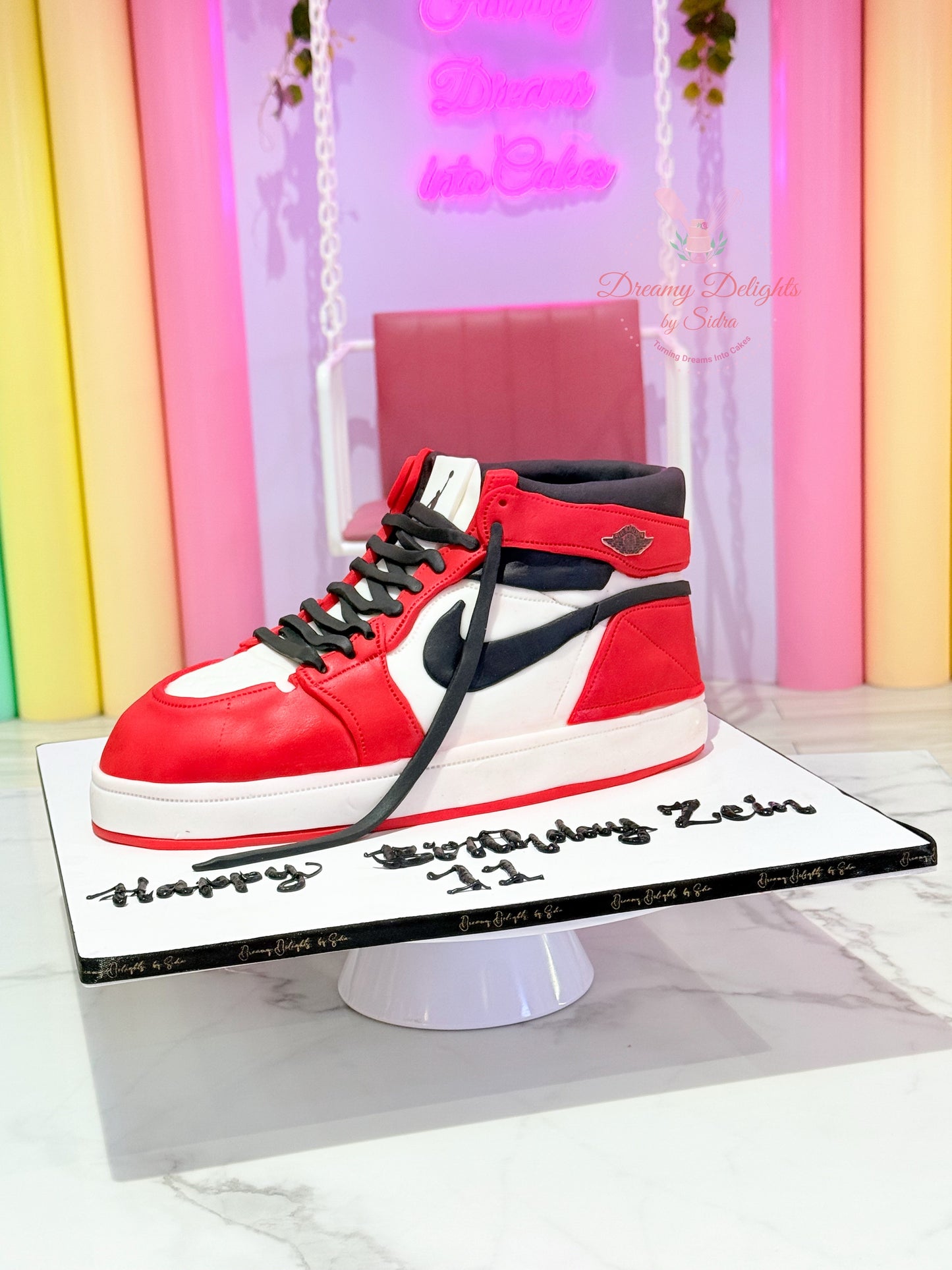 Jordan Air Sneakers Cake designed as realistic sneaker birthday cake for him in Dubai