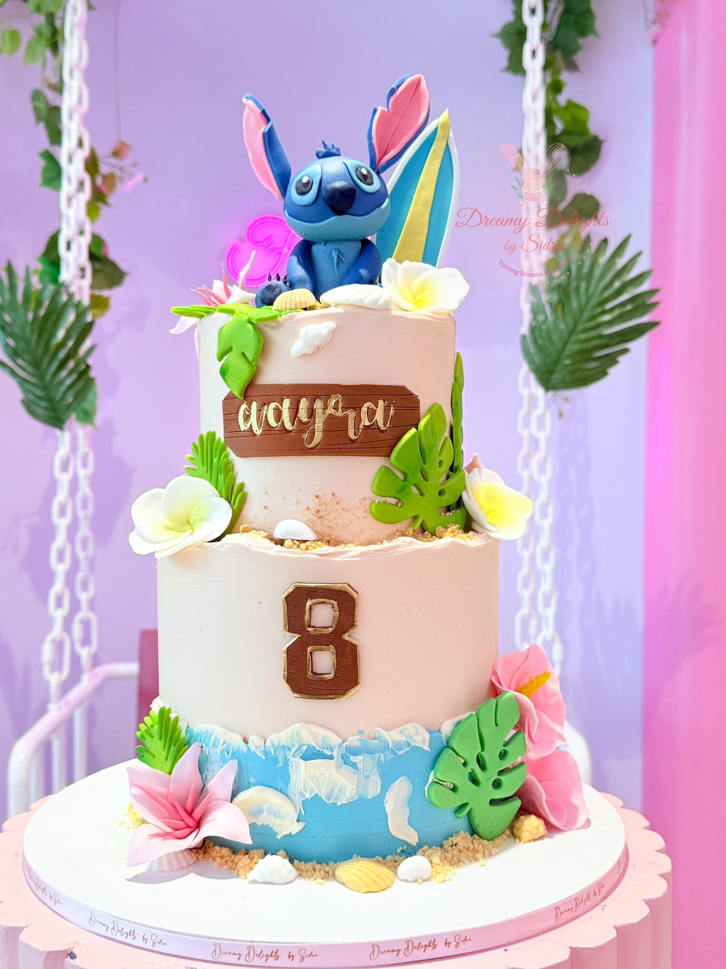 Stitch Surfboard Cake with tropical beach theme for girls birthday celebration in Dubai