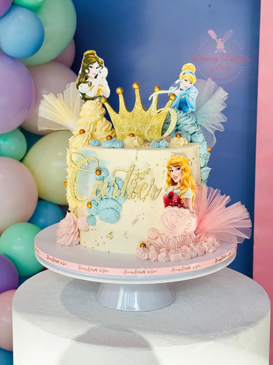 A decorated buttercream cake with 2D princess characters, custom name and age topper, and colorful accents.