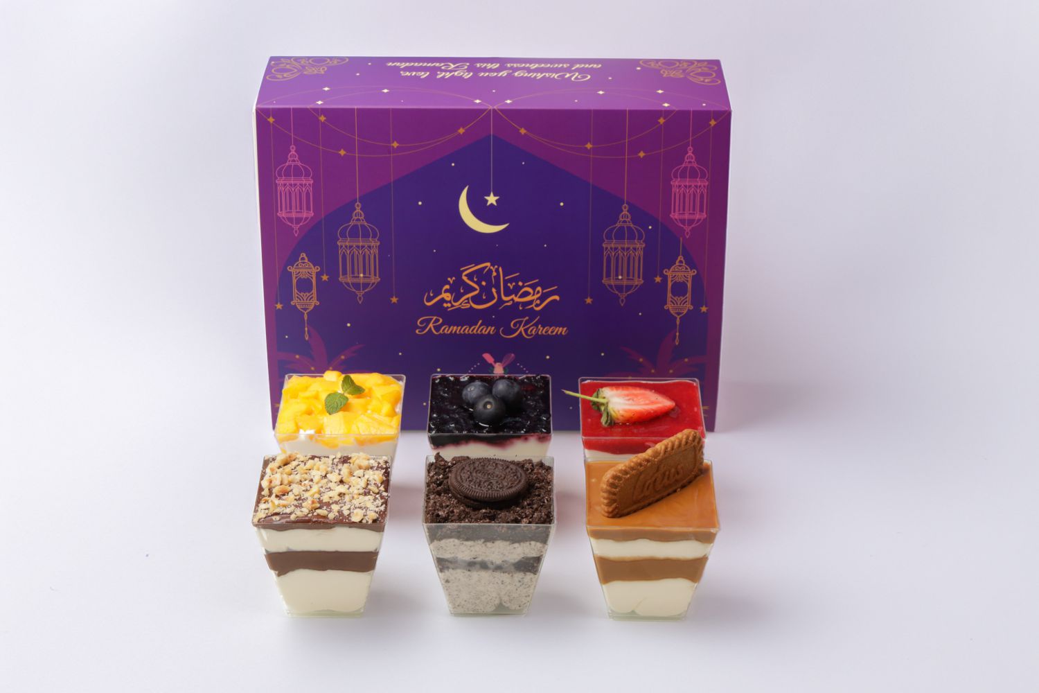 Ramadan cheesecake bundle box with mango strawberry blueberry oreo chocolate hazelnut and lotus cheesecake cups Dubai