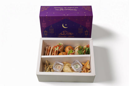Ramadan savory box mix sandwiches with katsu sando wraps fatayer hummus and garlic toum Ramadan catering box Dubai