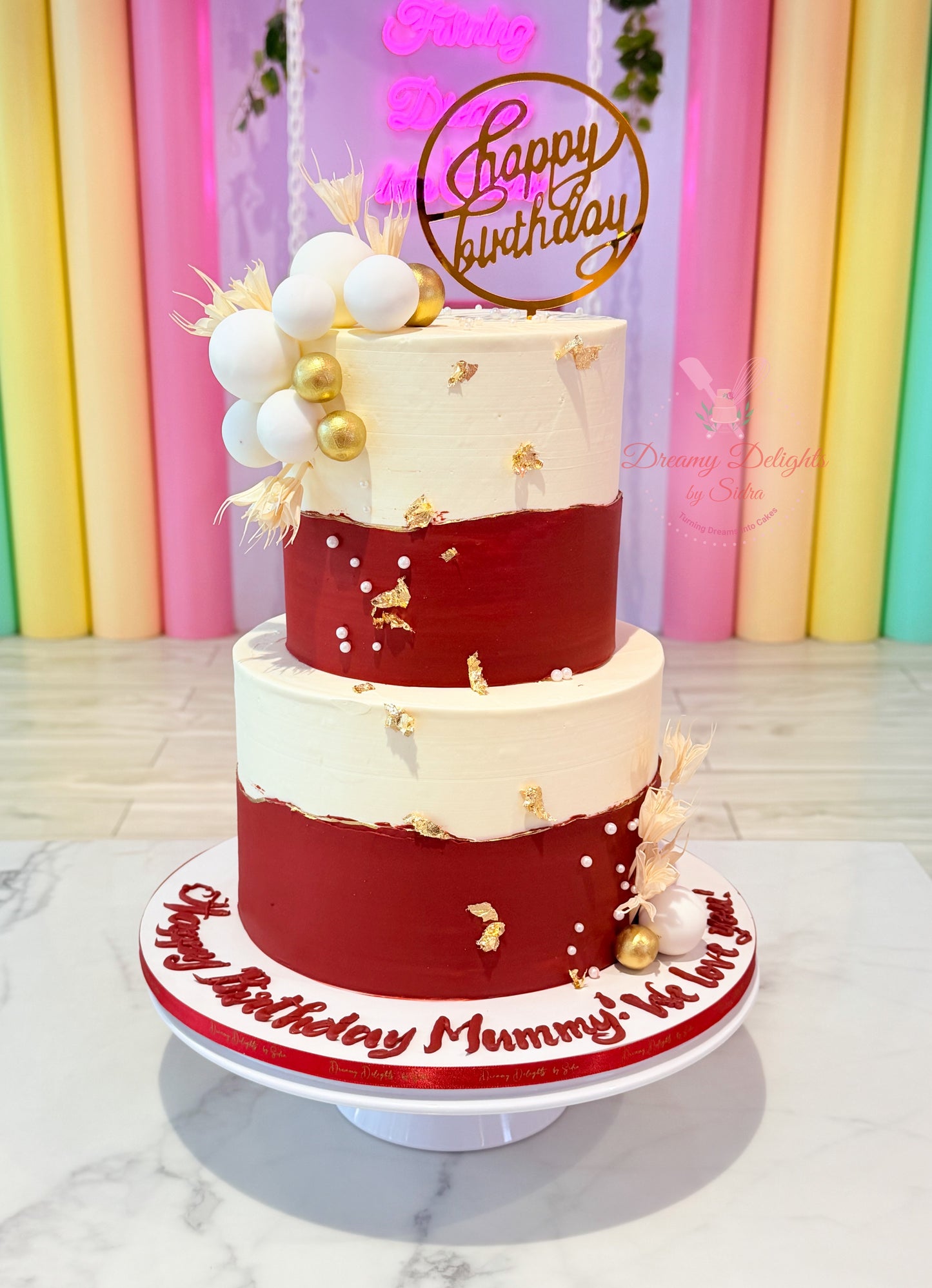 Red and White Dry Arrangement Cake with gold accents and elegant two-tier design in Dubai