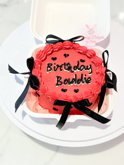 Red birthday bento cake with black ribbons mini celebration cake Dubai
