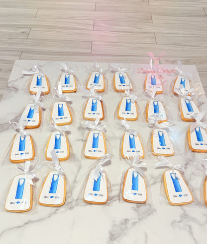 Custom shaped logo cookies individually wrapped with white ribbons for corporate branding, promotional events, and business gifting in Dubai.