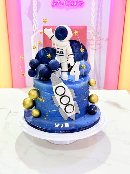 Spaceship astronaut cake for boys with space theme, NASA astronaut topper, rocket design, galaxy colors, and kids birthday celebration setup
