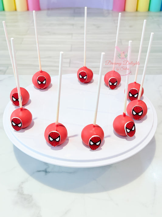 Spider-Man themed cake pops with edible superhero toppers for kids birthday parties and celebrations in Dubai.