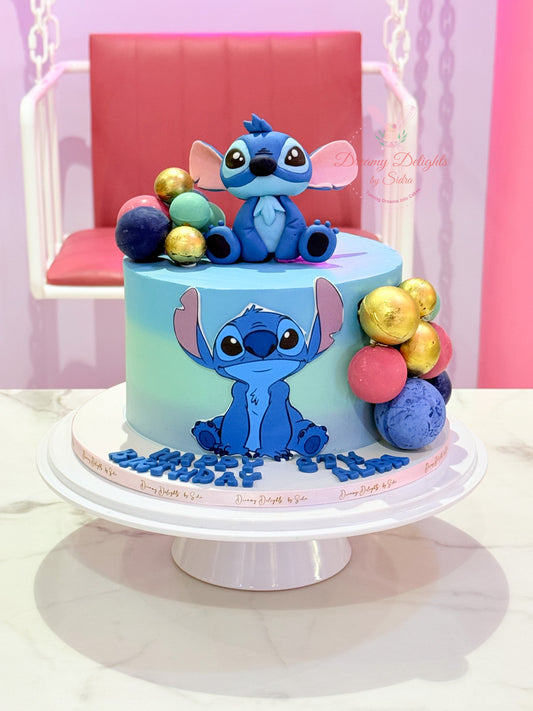 Stitch cake for girls with cartoon theme, blue buttercream finish, fondant Stitch topper, and decorative balls for kids birthday celebration
