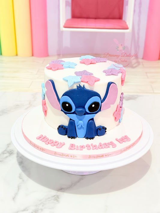 Stitch birthday cake for girls with fondant character and pastel decorations for kids celebration