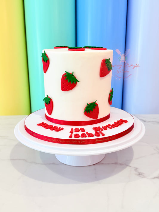 Two-tiered cake with strawberry design on a colorful background