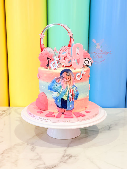 Colorful cake with cartoon character and music-themed decorations on a white marble surface.