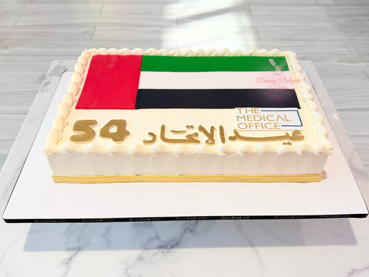 UAE National Day sheet cake with UAE flag, gold Arabic lettering and piped borders by Dreamy Delights by Sidra in Dubai