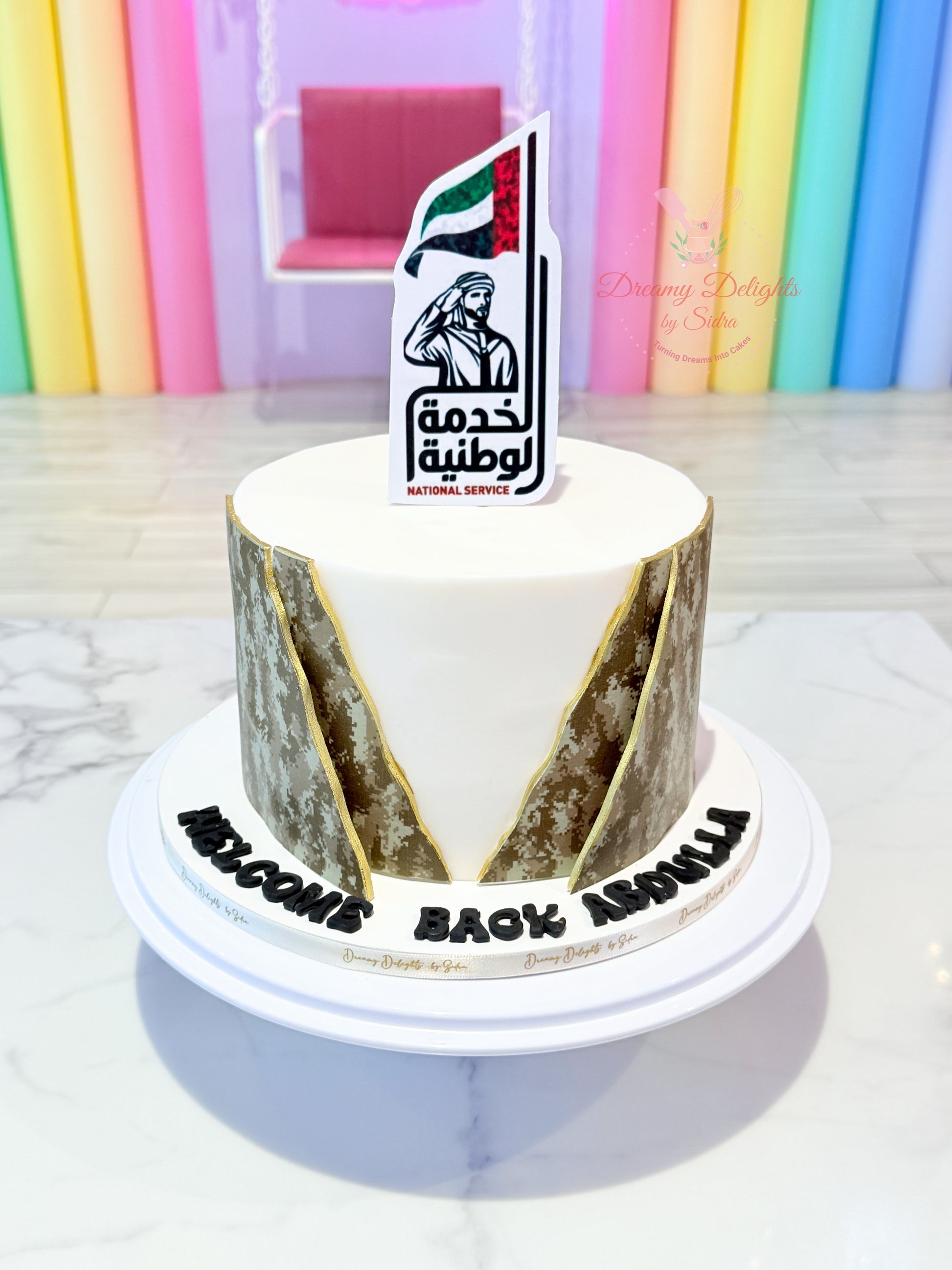 UAE national service welcome back celebration cake with camouflage design Dubai