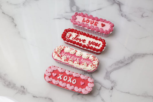 Valentine’s Day cake slabs with romantic messages and pink buttercream by Dreamy Delight by Sidra