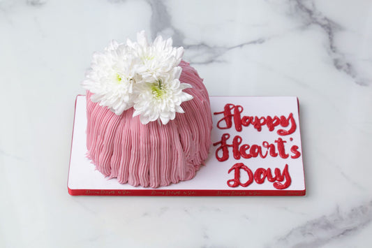 Valentine’s Day flower cake with pink frosting and fresh white chrysanthemums by Dreamy Delight by Sidra