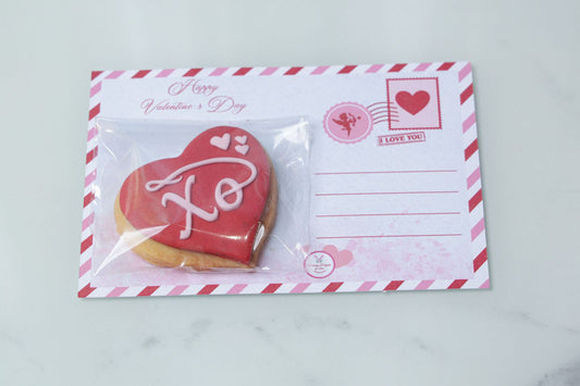 Valentine’s Day heart cookie with XO design and postcard by Dreamy Delight by Sidra