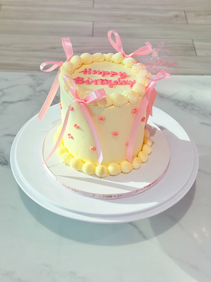 Vintage ribbons and hearts birthday cake in Dubai elegant custom cake for her